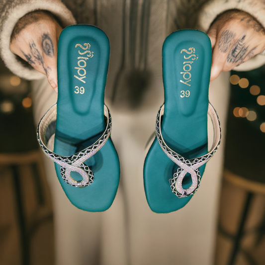 Elegant sparkle slippers for women, perfect evening footwear combining comfort and shimmering style.